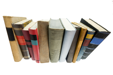Stack of old books isolated on whiteの写真素材