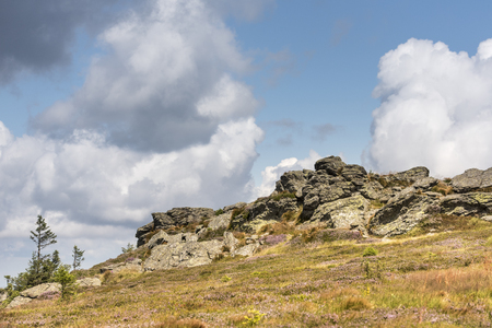 Mountain massif with rocks and dark cloudsの写真素材