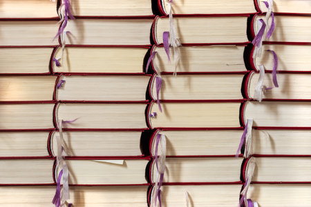 many stacked Christian hymn books filling the format as a background