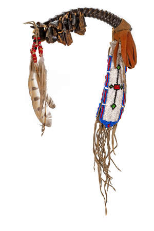 Dance rattle of the North American Indian horn with deer hooves and feathersの写真素材