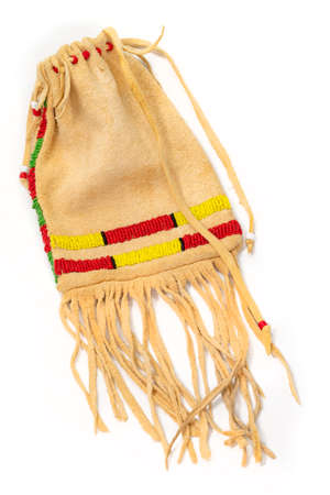 Bag of the North American Indians. Made from deerskin embroidered with colorful glass beads and leather cordsの写真素材