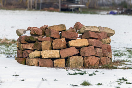 self-built wall made of natural sandstone as a biotope for insects