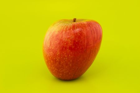 apple on a green backgroundの写真素材