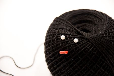 	 tangle of threads with eyesの写真素材