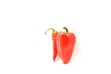 peppers with eyes on a white backgroundの写真素材