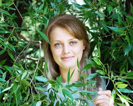 portrait of a young beautiful woman outdoorsの写真素材