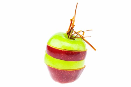 apple slices on each other with caramel isolated on whiteの写真素材