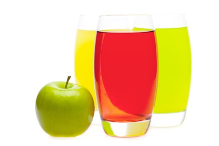 apple and juice in glasses isolated on whiteの写真素材