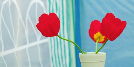 red tulips in a vaseの写真素材