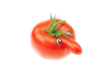 tomato with a nose isolated on whiteの写真素材