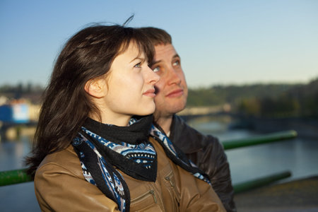 young couple on the Charles Bridge on the skylineの写真素材