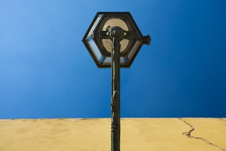 The lantern on the wall against the skyの写真素材