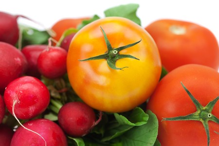 radish, cucumber and tomato isolated on whiteの写真素材