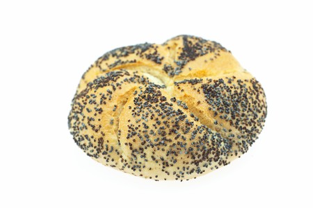 loaf with poppy seeds isolated on whiteの写真素材