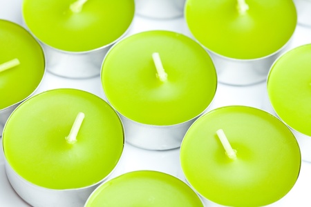 a background of a few tea candlesの写真素材