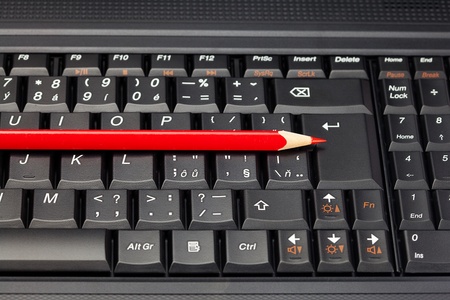 laptop keyboard and pencilの写真素材