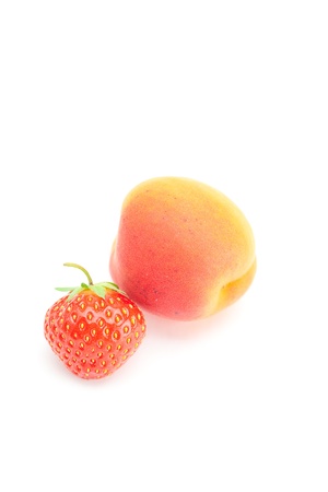 apricot and strawberry isolated on whiteの写真素材
