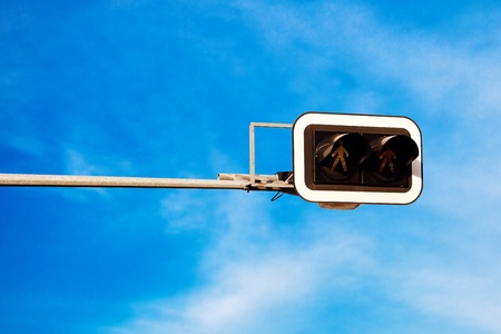 traffic lights against the blue skyの写真素材