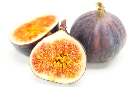 big juicy figs isolated on white
