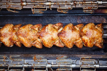 chicken grilled on a skewer backgroundの写真素材