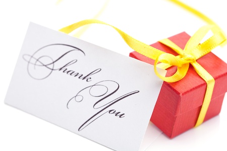red gift box and thank you card  isolated on whiteの写真素材