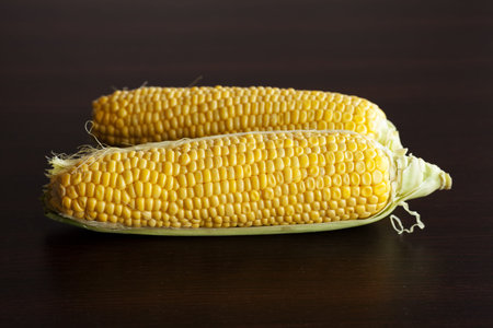 corn lying on a wooden table