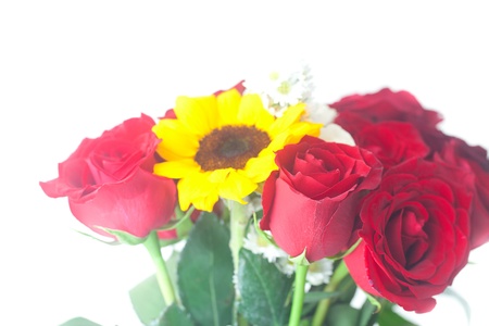 bouquet of red roses and sunflowersの写真素材