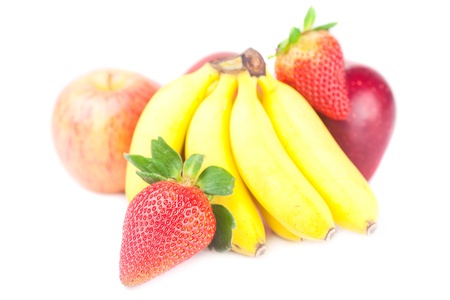 bunch of bananas,apples and strawberry isolated on whiteの写真素材