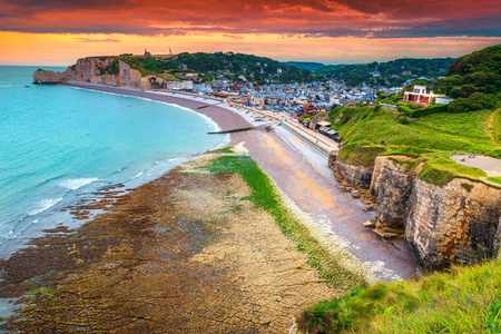 Magical sunset landscape, amazing colorful clouds and Atlantic Ocean with spectacular rocky coastline, Etretat, Normandy, France, Europeの写真素材