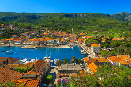 Fantastic travel and cruise destination. Mediterranean fishing and touristic village with beautiful harbor, Jelsa village, Hvar island, Dalmatia, Croatia, Europeの写真素材