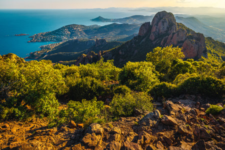 Stunning hiking destination near Cannes, Pic du Cap Roux peak. Beautiful red rock formations and seaside view from the peak, Esterel massif, near Saint-Raphael, Frejus, France, Europeの写真素材