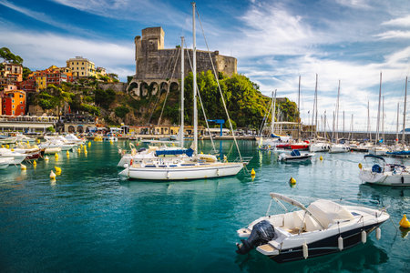 Admirable castle and moored boats in row in the harbor of Lerici, Liguria, Italy, Europeの写真素材