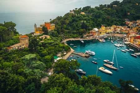 Beautiful view with colorful seaside buildings and anchored boats in the bay of Portofino, Liguria, Italy, Europeの写真素材