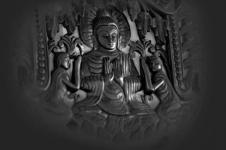 soft and blurry focus  Buddha wall wood carve (close-up)