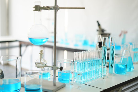 Research Test tube in scientist in laboratory, chemical liquid to test tubes, science and medical research and development conceptの写真素材