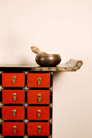 a prayer bowl and a medicine cabinetの写真素材