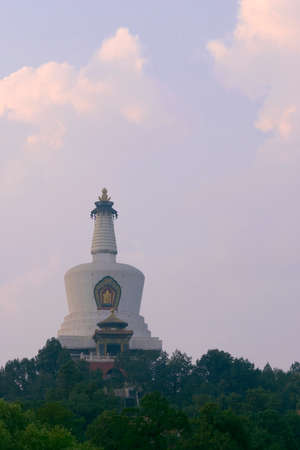 White pagoda at beihai park in Beijing at dusk. A Buddhist temple in an imperial garden.の写真素材