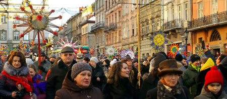 Lviv, Ukraine - January 8, 2016: Participants of the mass holiday festivities are going in the center of the city during the celebration of Orthodox Christmas.のeditorial素材