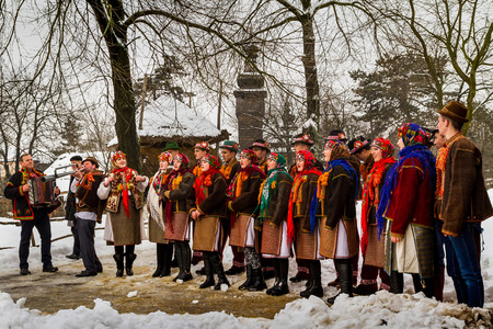 Uzhgorod, Ukraine - January 15, 2017: Female folklore collective performs during the seventh ethnic festival Christmas Carols in the old village. During the festival, visitors can familiarize with a variety of Christmas customs, caroling and celebrations のeditorial素材