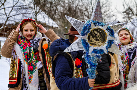 Uzhgorod, Ukraine - January 15, 2017: Female folklore collective performs during the seventh ethnic festival Christmas Carols in the old village. During the festival, visitors can familiarize with a variety of Christmas customs, caroling and celebrations のeditorial素材