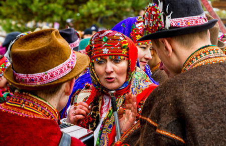 Uzhgorod, Ukraine - January 15, 2017: Participants in folklore collectives talking during the seventh ethnic festival Christmas Carols in the old village. During the festival, visitors can familiarize with a variety of Christmas customs, caroling and celeのeditorial素材
