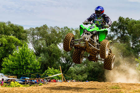 Uzhgorod, Ukraine - May 21, 2017: Unidentified ATV rider in action on the Championship of Zakarpatie region on motocross on May 21, 2017 in Uzhgorod, Ukraine.のeditorial素材