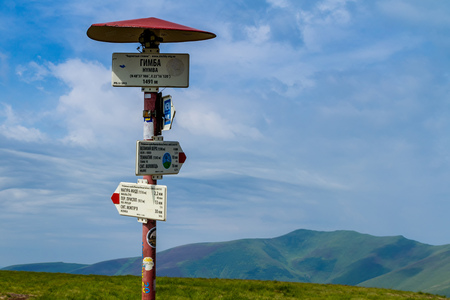 Pylypets, Ukraine - June 25, 2017: Information index at the peak of Mount Hymba in the Carpathians near the village of Pylypets.のeditorial素材