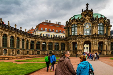 Dresden, Germany - July 26, 2017: Tourists considered landmarks in the Zwinger Palace in the historical part of the beautiful Dresden.のeditorial素材