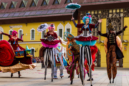 Debrecen, Hungary - August 20, 2017: Carnival dancers on stilts performs during the 48th Flower Carnival in the center of Debrecen, Hungary.のeditorial素材