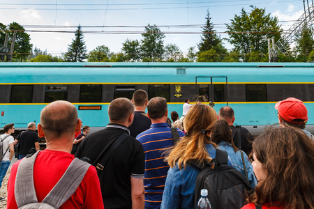 Skotarske, Ukraine - May 24, 2018: Passengers waiting for a train on the platform of the railway station in the Carpathians.のeditorial素材