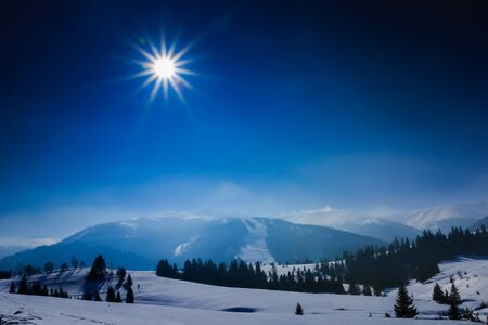 Misty morning among beautiful winter mountains. Winter landscape in Carphatians Mountain (Ukraine).の写真素材