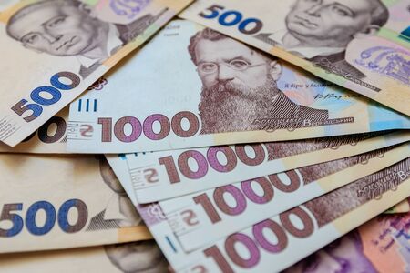 Ukrainian hryvnia, several banknotes of 1000 and 500 hryvnias. Financial background from Ukrainian banknotes.  Close-up.の写真素材