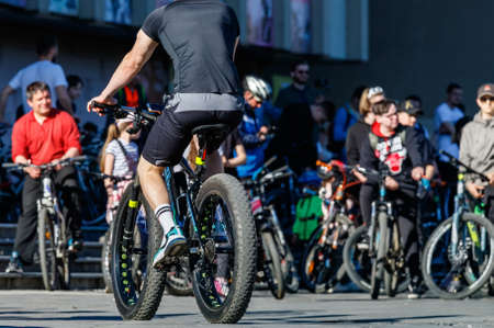Uzhgorod, Ukraine - May 10, 2021: Cyclists gather in the square before the mass bike ride during the opening of the cycling season.のeditorial素材