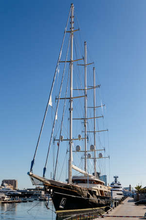 Barcelona (Catalonia, Spain) - January 7, 2022: Moored beautiful superyachts at Port Vell harbor in the Catalan capital.のeditorial素材